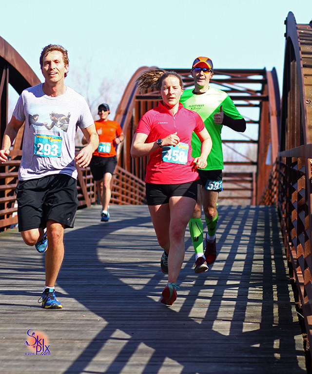 Runners crossing bridge during the Half Marathon Unplugged